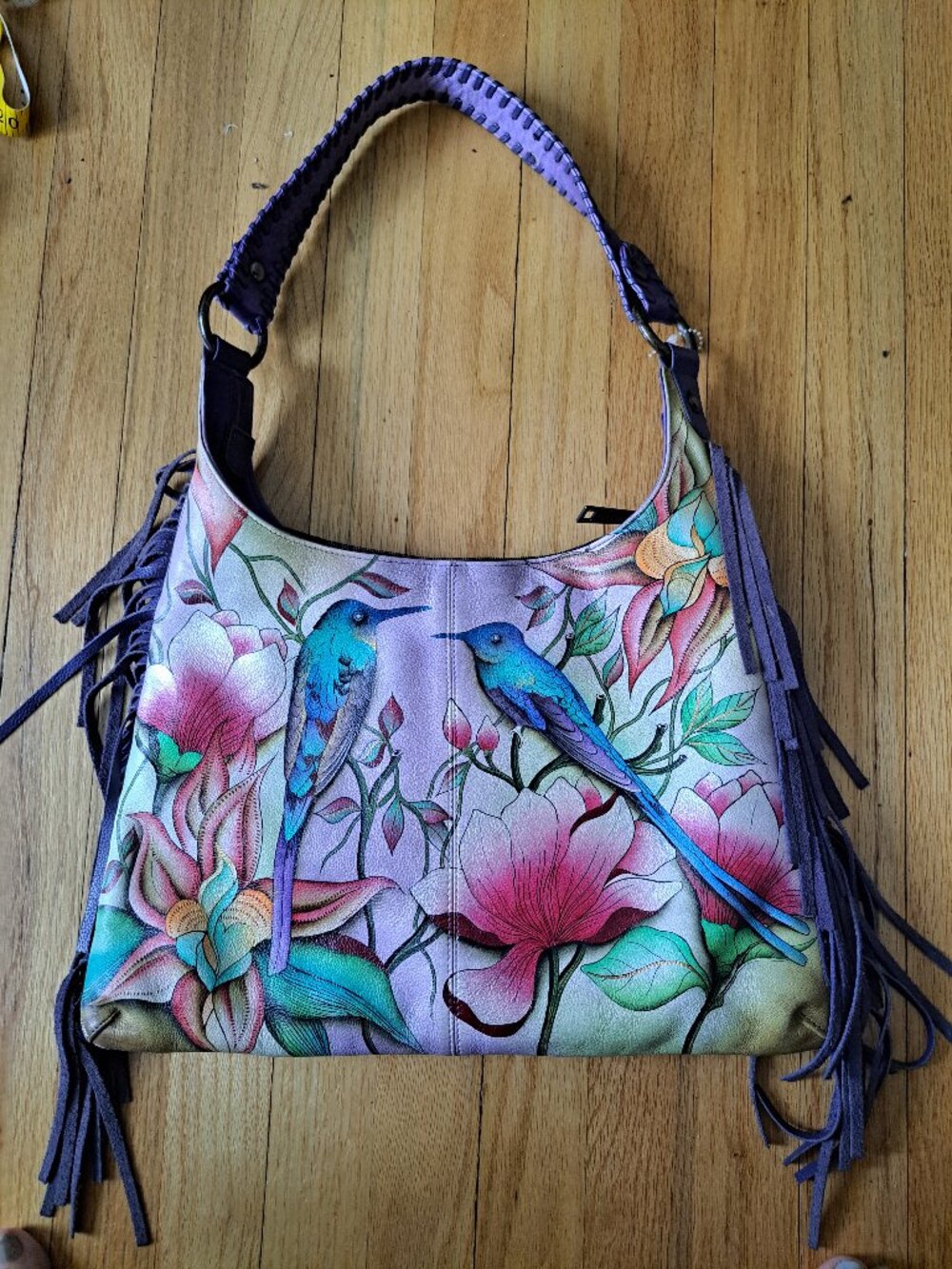 This vibrant, hand-painted leather bag is the Spring Passion Fringed Shoulder Ho